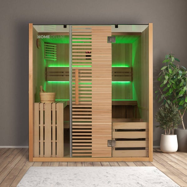Home Deluxe Infrarotkabine aus Holz mit Glaselementen und grüner LED Beleuchtung in einem Innenraum.