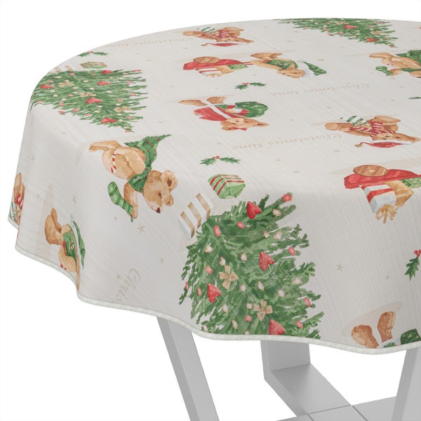 Runde Tischdecke mit Weihnachtsmotiven auf einem Tisch