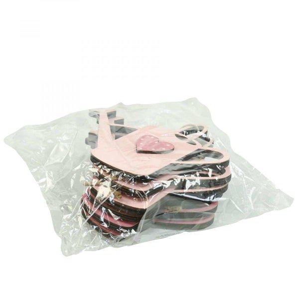 Verpackung mit Holzdekorationsanhängern in Hausform mit Herz