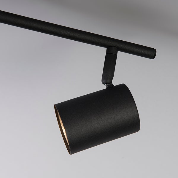 Schwarze Schienenleuchte mit zylindrischem Spotkopf