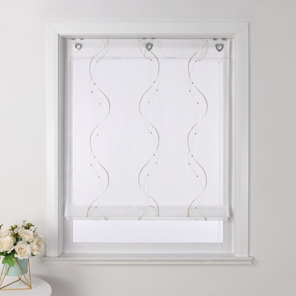 Dekoratives Fensterrollo mit geschwungenem Muster im weißen Rahmen