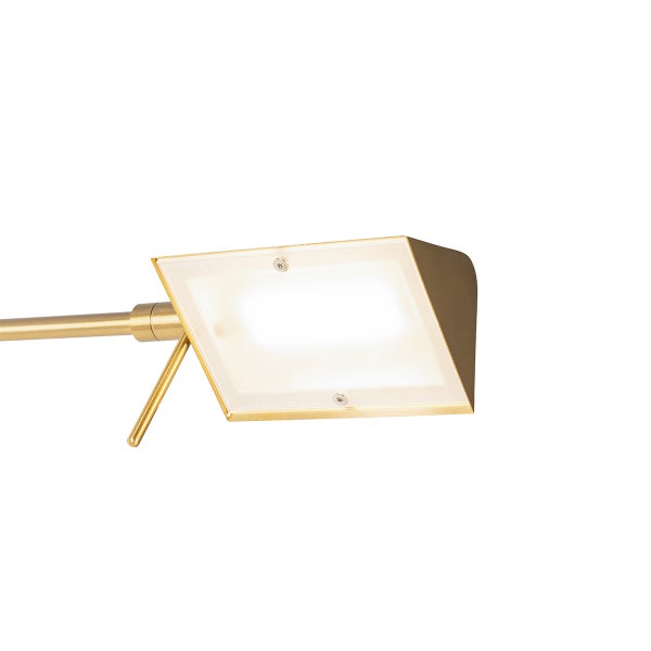 Nahaufnahme einer goldenen Leselampe