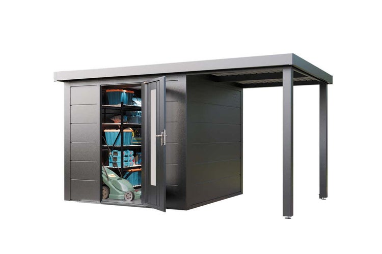 Japanische Herbst-Anemone mit grünen Blättern und rosa Blüten im Garten.