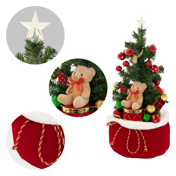 Künstlicher Weihnachtsbaum mit LED Stern Spitze, Teddybär und Geschenken auf einem Weihnachtssack Sockel