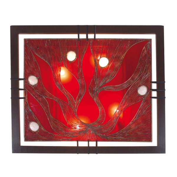 Dekorative Wandleuchte mit rotem Hintergrund und Ornamenten in einem dunklen Rahmen