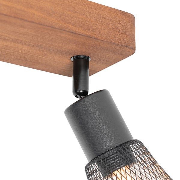 Detailansicht einer Deckenleuchte mit Holzelement und schwarzem Metallschirm