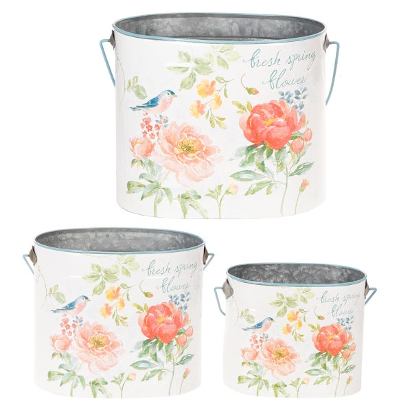 Dreiteiliges Set Pflanztöpfe aus Metall mit Blumenmuster und Vogelmotiv.