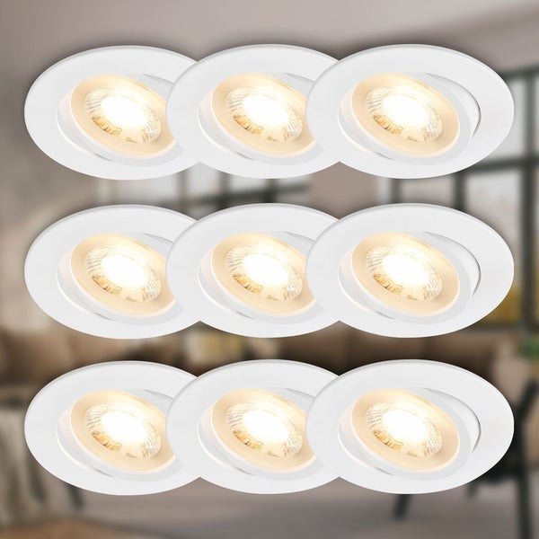 Neun runde, weiße Einbauspots mit warmweißem Licht