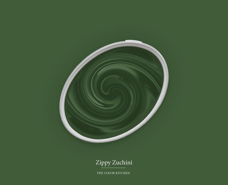 Dunkelgrüne Wandfarbe Zippy Zucchini von The Color Kitchen als Farbwirbel in einer ovalen Form.