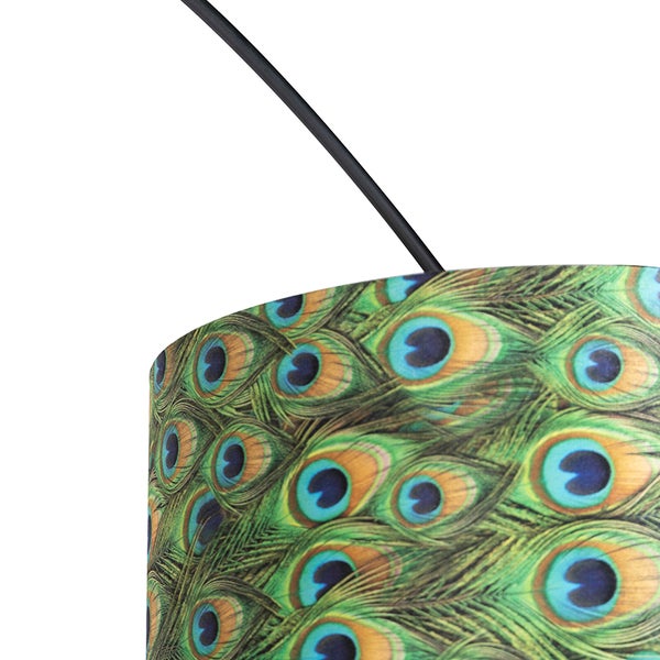 Nahaufnahme einer Lampe mit Pfauenfeder Muster