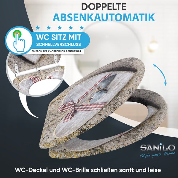 Sanilo WC Sitz mit Absenkautomatik und Schnellverschluss im rustikalen Design mit Schleifenmotiv.
