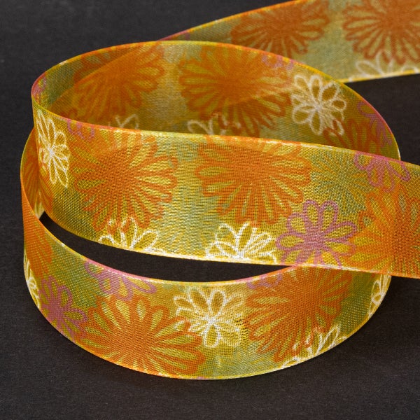 Transparentes Textilband mit floralem Muster und verschiedenen Blumengrößen für Dekoration und Bastelarbeiten.