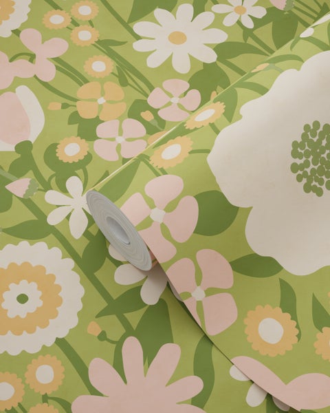 Vliestapete mit floralem Retro Muster, verschiedenen Blütenformen und Blattmotiven.