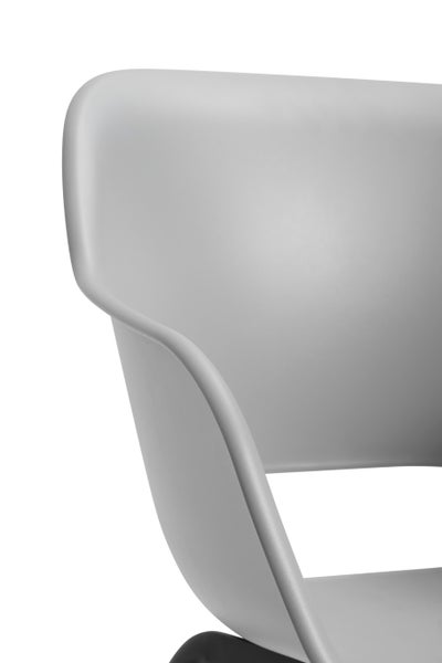 Detailansicht eines grauen Schalenstuhls