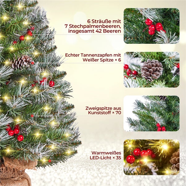 Detailaufnahme eines geschmückten Weihnachtsbaums mit LED-Lichtern, Tannenzapfen und roten Beeren