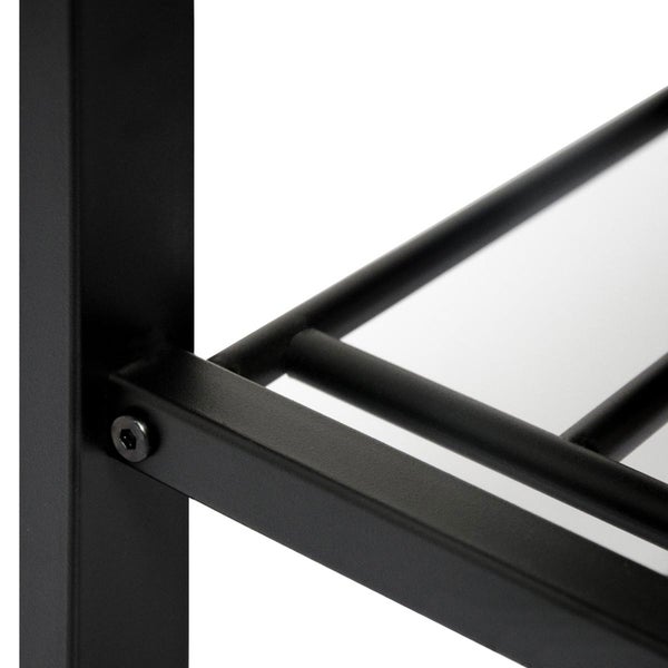 Detail einer schwarzen Metallrahmenverbindung mit Innensechskantschraube und runden Querstangen.