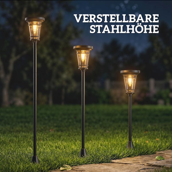 Zwei schwarze Solar-Wegeleuchten in Laternenform mit einem Erdspiess und Detailansicht des Lampenkopfes inklusive Solarpanel.