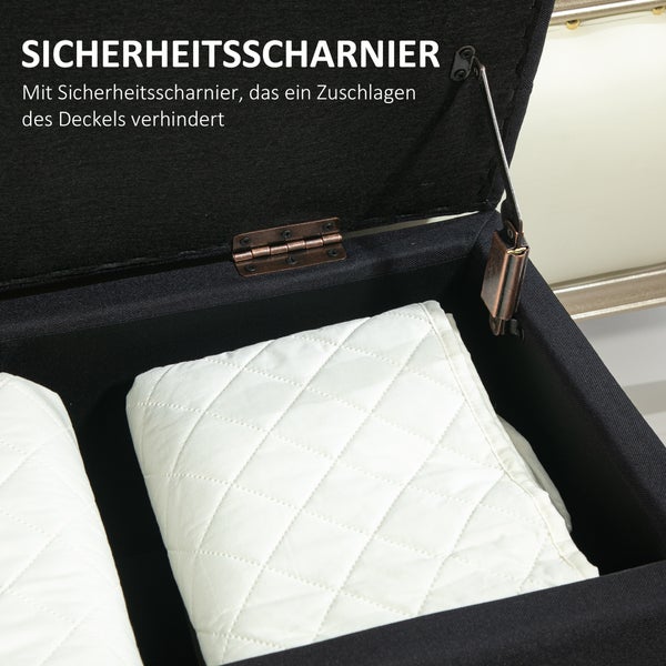 Innenansicht einer Truhe mit Sicherheitsband und weißer Steppdecke