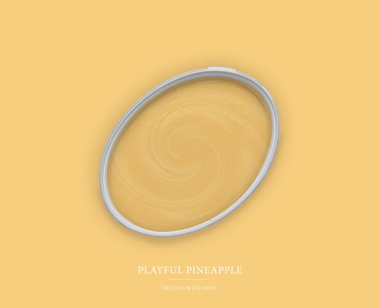 Draufsicht auf einen geöffneten Farbeimer mit hellgelber Wandfarbe, Farbton Playful Pineapple von The Color Kitchen.