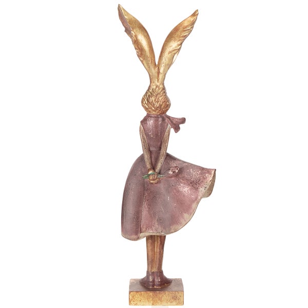 Dekorative Hasenfigur im Kleid als Osterdekoration