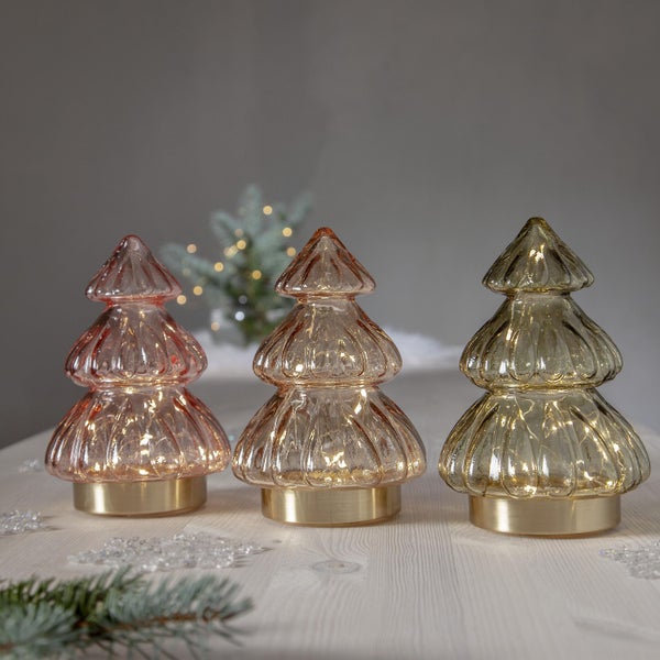 Dekorative Weihnachtsbäume aus Glas mit Beleuchtung