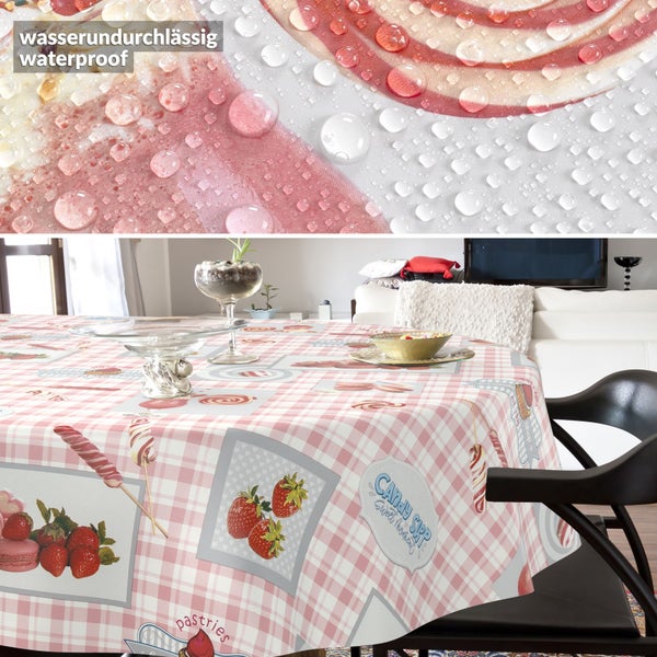 Tischdecke mit rosa-weißem Karomuster und Motiven von Erdbeeren und Süßigkeiten, wasserundurchlässiges Material mit abperlenden Wassertropfen.