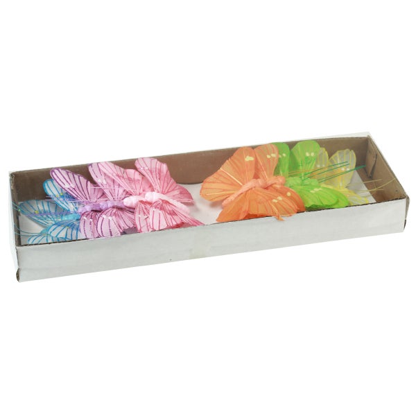 Dekorative Schmetterlinge aus Textil in einer Verpackung.