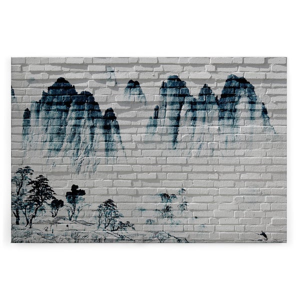Wandbild mit asiatischer Berglandschaft auf Backsteinoptik als Vliestapete zur Wandgestaltung