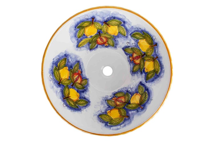 Runde Tischplatte aus Keramik mit handgemaltem Zitronen- und Granatapfel-Motiv sowie zentralem Loch.