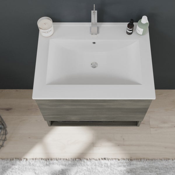 Waschtischunterschrank mit Waschbecken und Armatur im Badezimmer