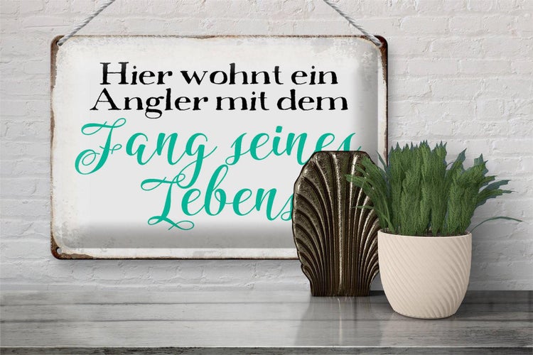 Blechschild Spruch 30x20cm hier wohnt Angler mit dem Fang