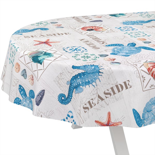 Runde Tischdecke mit maritimem Muster aus Seepferdchen, Seesternen, Schildkröten, Muscheln und Seaside-Schriftzug.