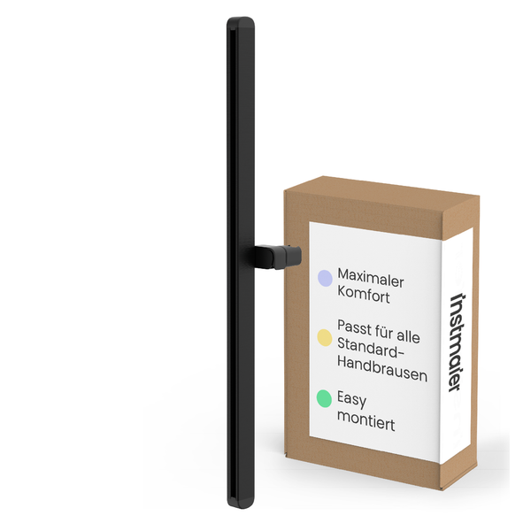 Schwarze Brausestange von instmaier mit Gleitschieber für alle Standard Handbrausen inklusive Produktverpackung.