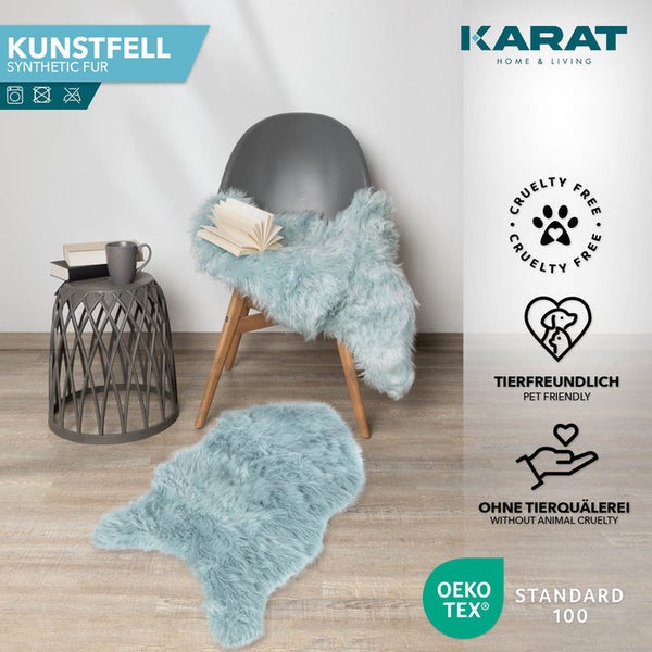 Weiches Kunstfell auf modernem Stuhl und Boden, Karat Home & Living Logo, Oeko-Tex Standard 100, tierfreundlich und ohne Tierquälerei.