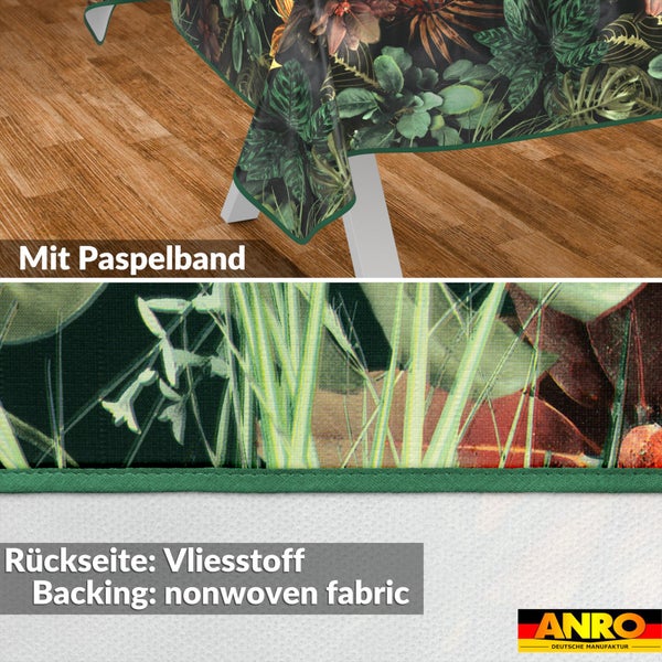 Tischdecke mit tropischem Blattmuster, Paspelband und Vliesstoff-Rückseite. ANRO Logo.