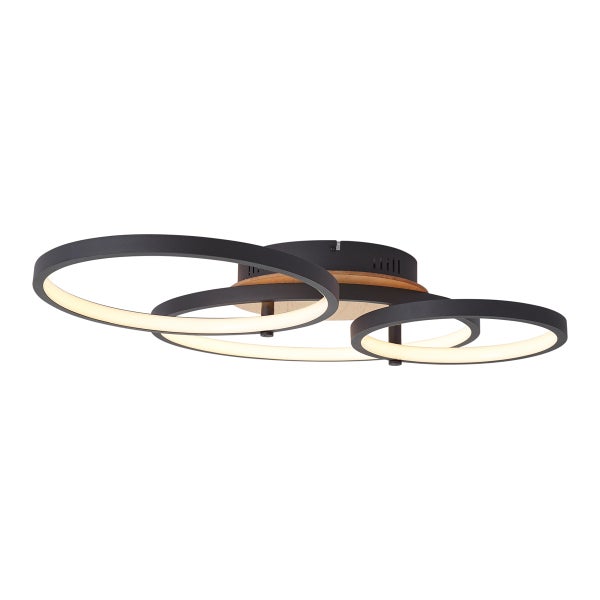 Moderne LED Deckenleuchte mit drei ineinander verschlungenen ringförmigen Leuchtelementen aus Metall und Holzoptik.