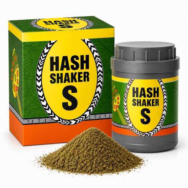 Hash Shaker S Set bestehend aus einem quadratischen Karton, einem zylindrischen Shaker-Behälter mit Schraubdeckel und einem Haufen Granulat.