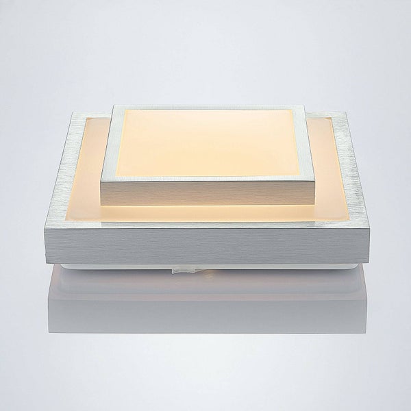 Quadratische LED Deckenleuchte mit Rahmen aus gebürstetem Metall und zwei Leuchtebenen.