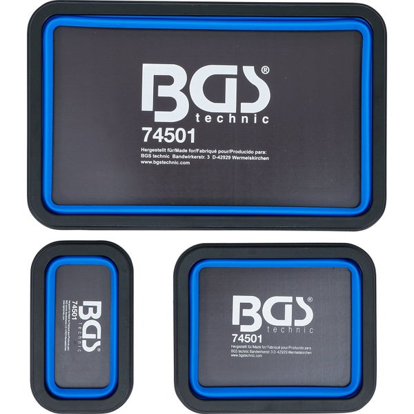 Drei magnetische Werkzeugschalen in verschiedenen Größen an einem Werkstattwagen mit Schrauben, Steckschlüsseln und Ratschen.