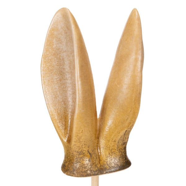 Dekorative Hasenohren auf einem Holzstab