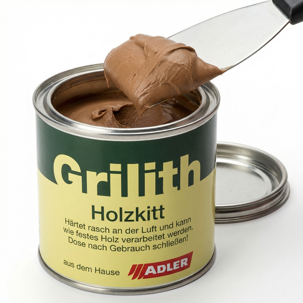 Adler Grilith Holzkitt in der geöffneten Dose mit Spachtelmasse auf einem Spachtel.