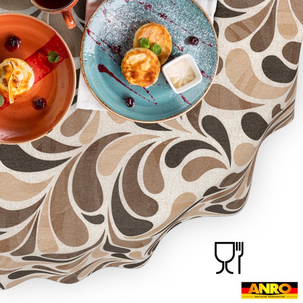 Abwaschbare Tischdecke mit braunem Tropfenmuster, gedeckter Tisch mit Speisen, ANRO Logo, lebensmittelecht.