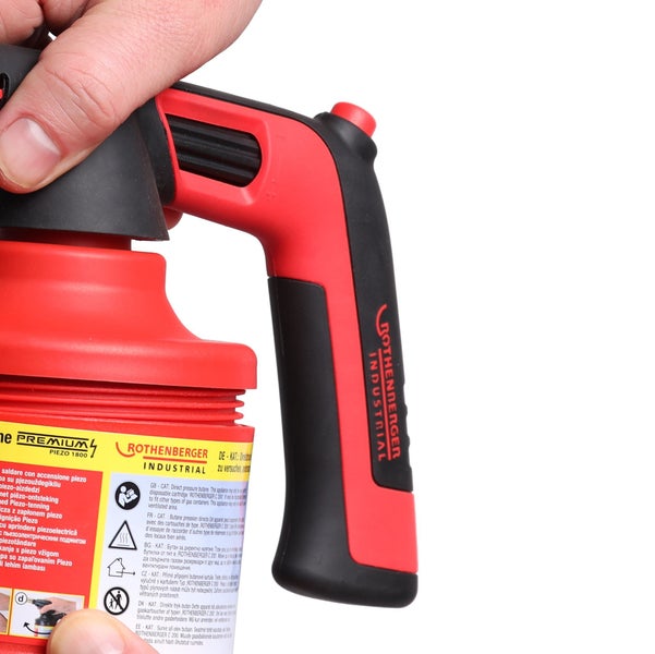 Nahaufnahme eines Gasbrenners mit Handbedienung und Rothenberger Industrial Logo.