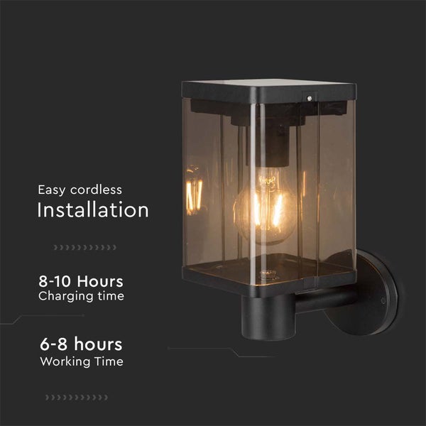 Wandleuchte mit Glühbirne und transparentem Gehäuse für den Außenbereich