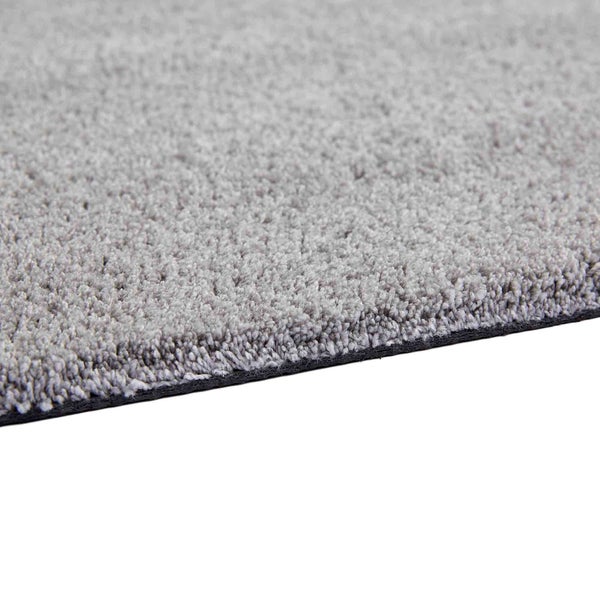 Nahaufnahme eines grauen Teppichs