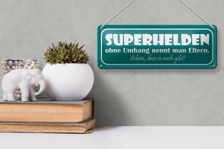Blechschild Spruch 27x10cm Eltern Superhelden ohne Umhang Dekoration