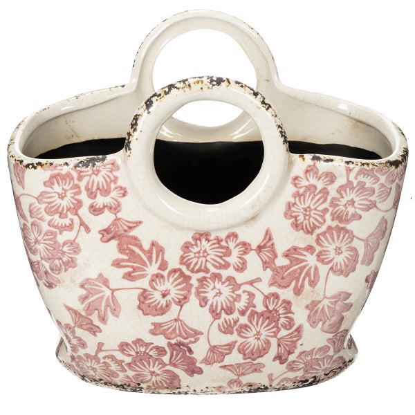 Keramik-Pflanztopf in Handtaschenform mit zwei runden Griffen und Blumenmuster.