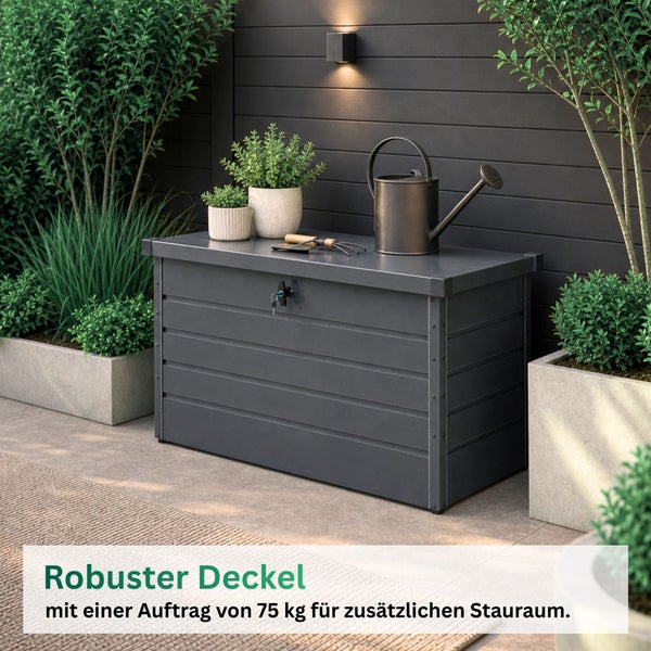 Abschließbare Gartenbox in Dunkelgrau auf einer Terrasse mit Pflanzen und einem robusten Deckel, der bis zu 75 Kilogramm belastbar ist.