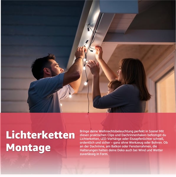 Familie befestigt eine Lichterkette an einem Dachvorsprung.
