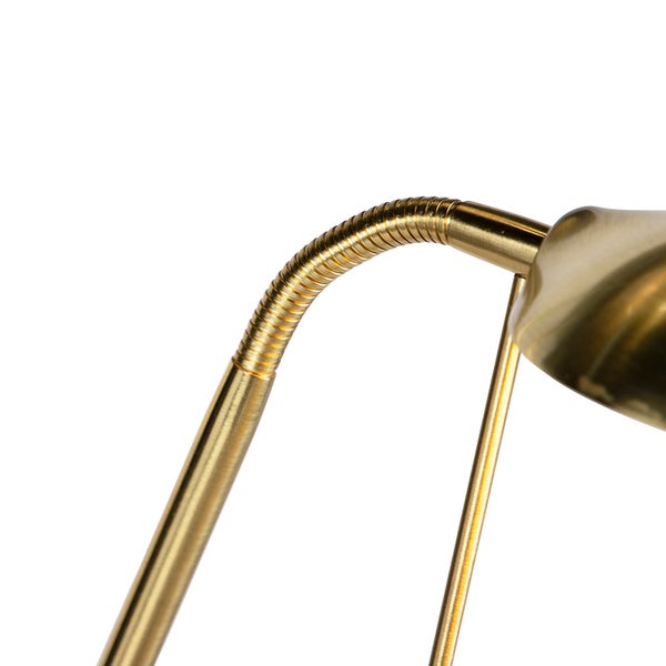 Detailaufnahme einer goldenen Schreibtischlampe mit flexiblem Hals.